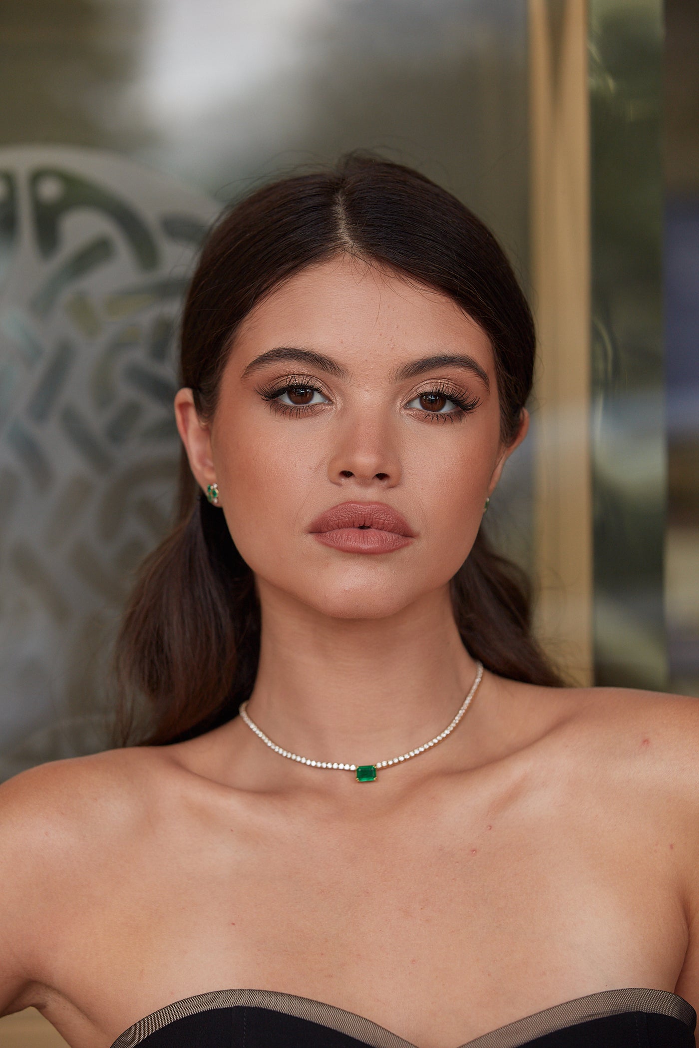 Emerald & Diamond Tennis Necklace In 18K Yellow Gold - Tresor Collection Lifestyle view of 18K gold emerald and diamond necklace – sophisticated handcrafted jewelry by Tresor Collection