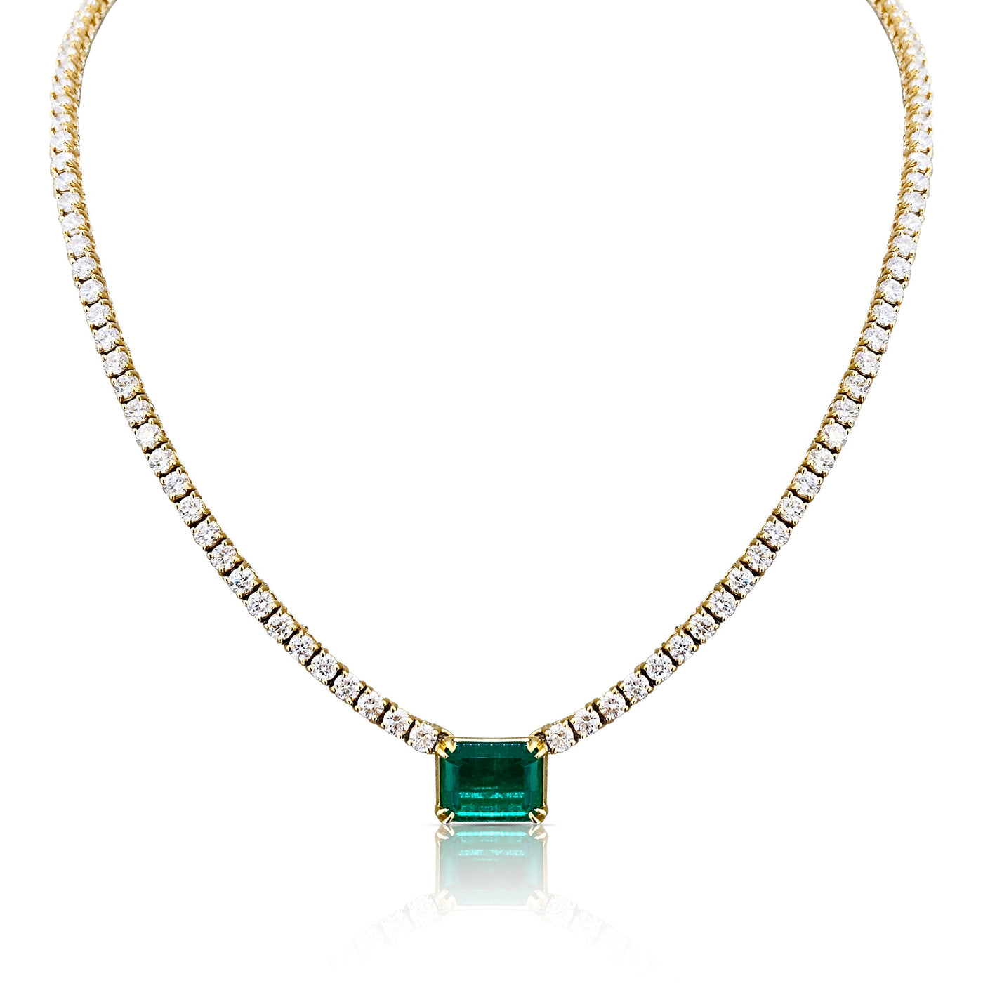 18K Gold Emerald & Diamond Tennis Necklace – Designer Fine Jewelry by Tresor Collection 18K gold emerald and diamond tennis necklace flatlay – luxury fine jewelry by Tresor Collection