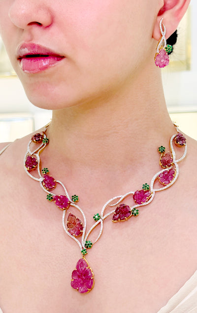 Tourmaline Carved Leaves, Emerald & Diamond Necklace In 18K Yellow Gold - Tresor Collection Side view of ruby and emerald gemstone necklace on model – designer handcrafted jewelry