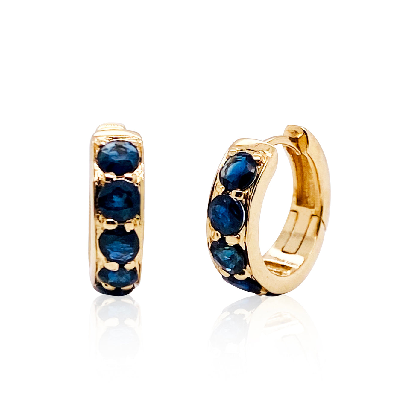 Blue Sapphire Rd. Huggies Earring In 18K Yellow Gold