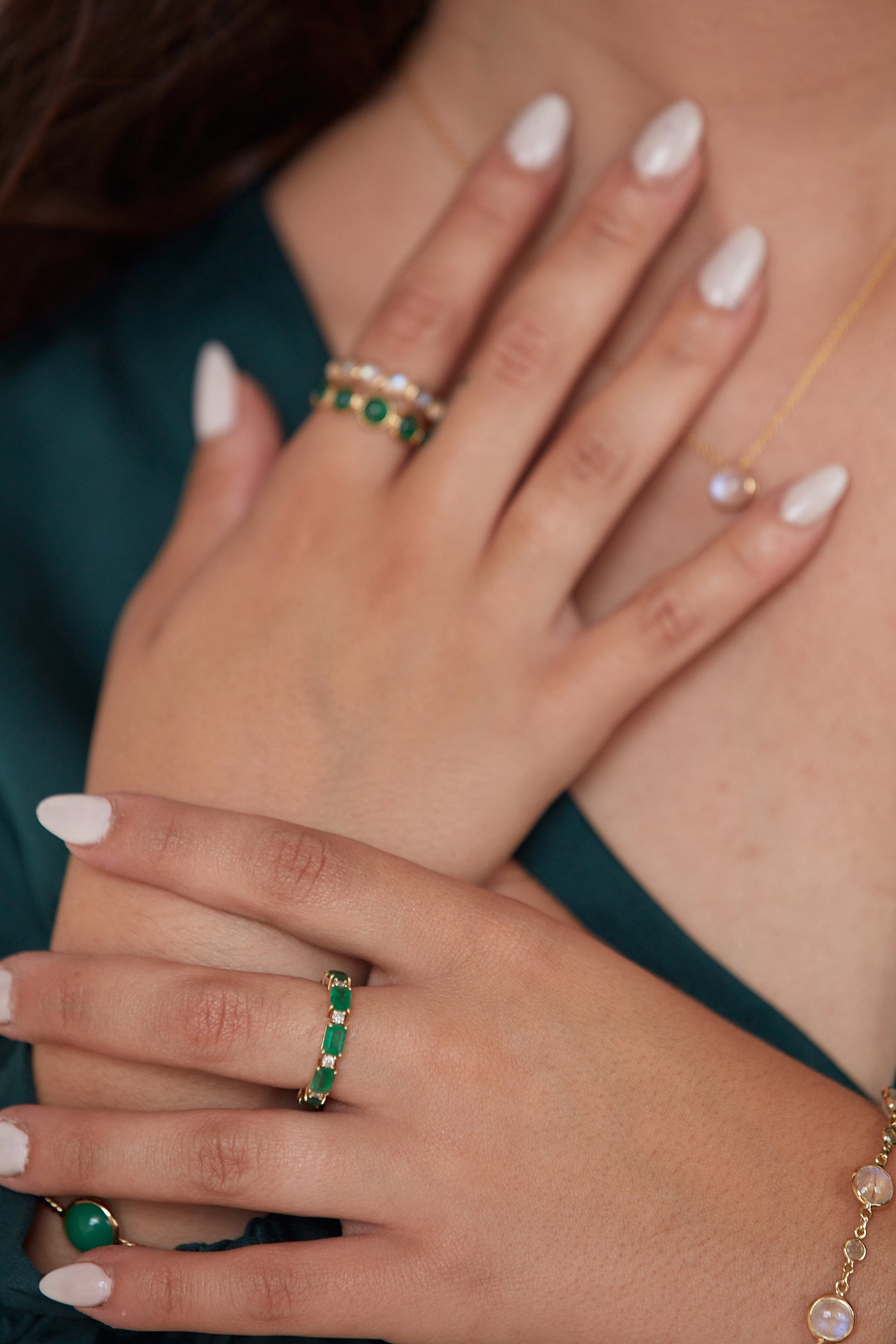 Emerald Rectangle And Diamond Ring In 18K Yellow Gold - Tresor Collection Model wearing emerald eternity band ring on hands – premium luxury jewelry styling