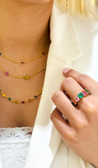 Multicolor Stone Mix Shape Ring In 18K Yellow Gold - Tresor Collection Close-up of multicolor gemstone ring – focusing on the intricate details of the ring and the stones' brilliance.