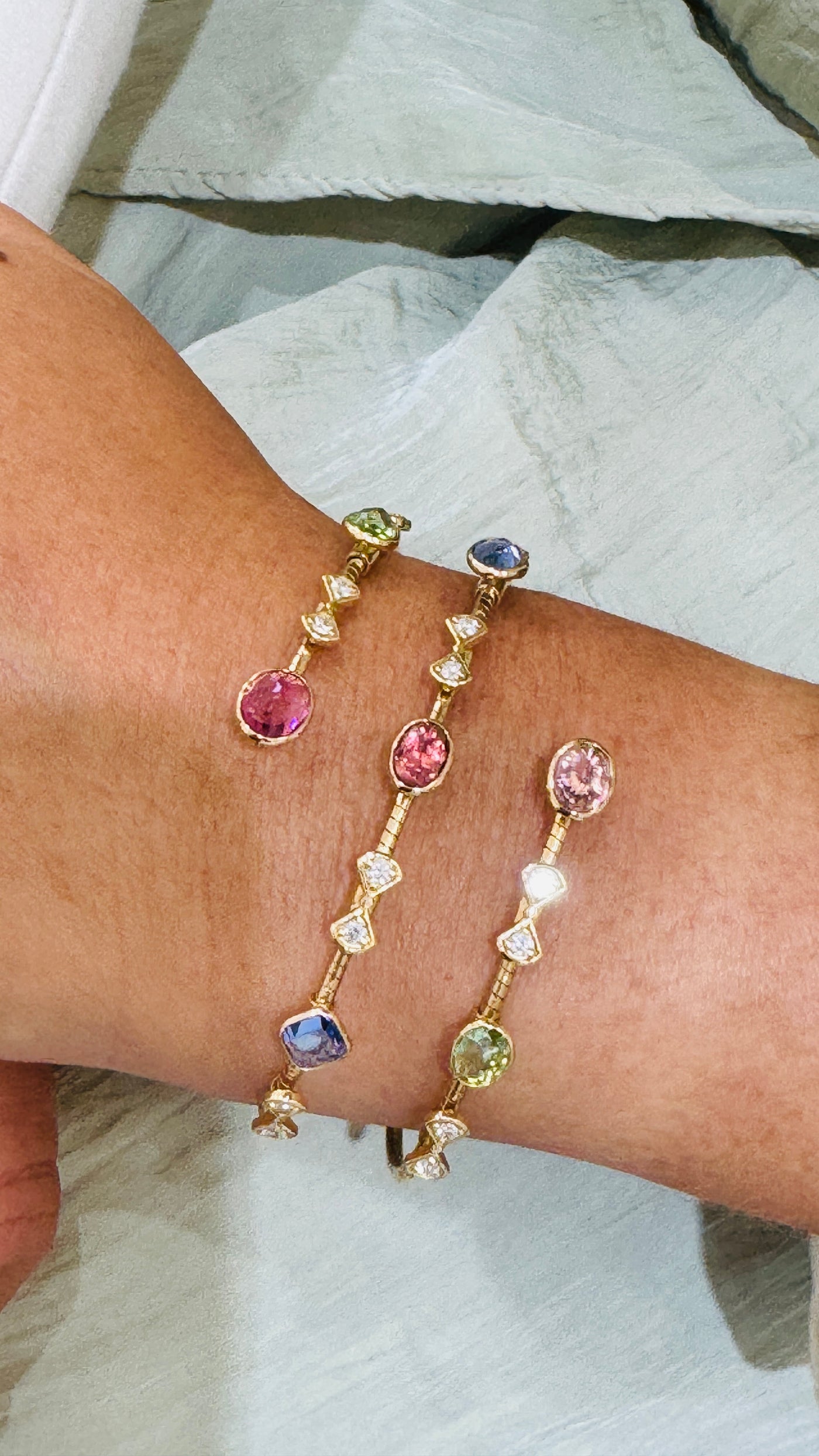 Gold multi-gemstone bangle styled for everyday elegance – luxury handcrafted jewelry from Tresor Collection