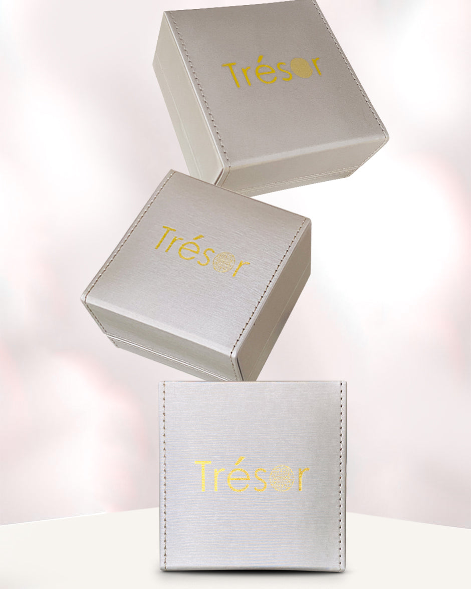 Tresor Collection packaging for ruby gold earrings – designer fine jewelry boutique presentation