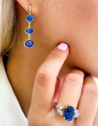 18K Gold Tanzanite & Diamond Oval Ring – Flora Collection - Tresor Collection Coordinated Tanzanite earrings and ring set in 18K gold – fine jewelry styling inspiration