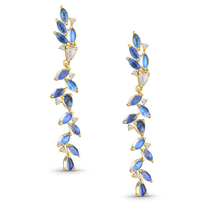 18K gold Rainbow Moonstone earrings flatlay – luxury handcrafted jewelry with marquise-cut gemstones.