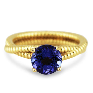 18K gold Tanzanite round ring – handcrafted blue gemstone fine jewelry Gold tanzanite ring front view – showcasing an elegant design with a vibrant blue gemstone.