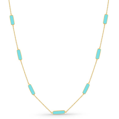Necklace with turquoise rectangular stones on a gold chain against a white background 18K gold turquoise necklace flatlay – luxury fine jewelry by Tresor Collection