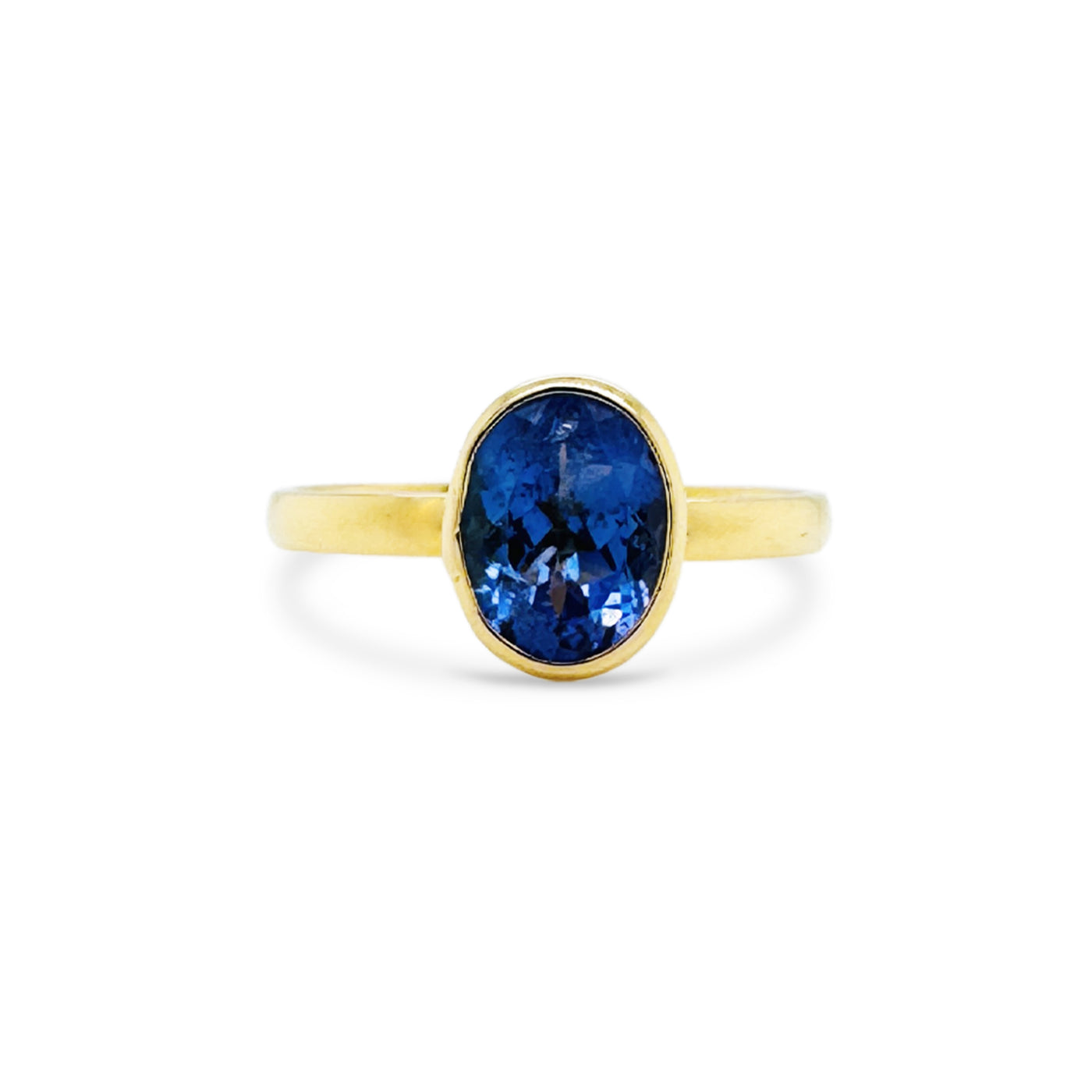 Tanzanite Oval Ring In 18K Yellow Gold