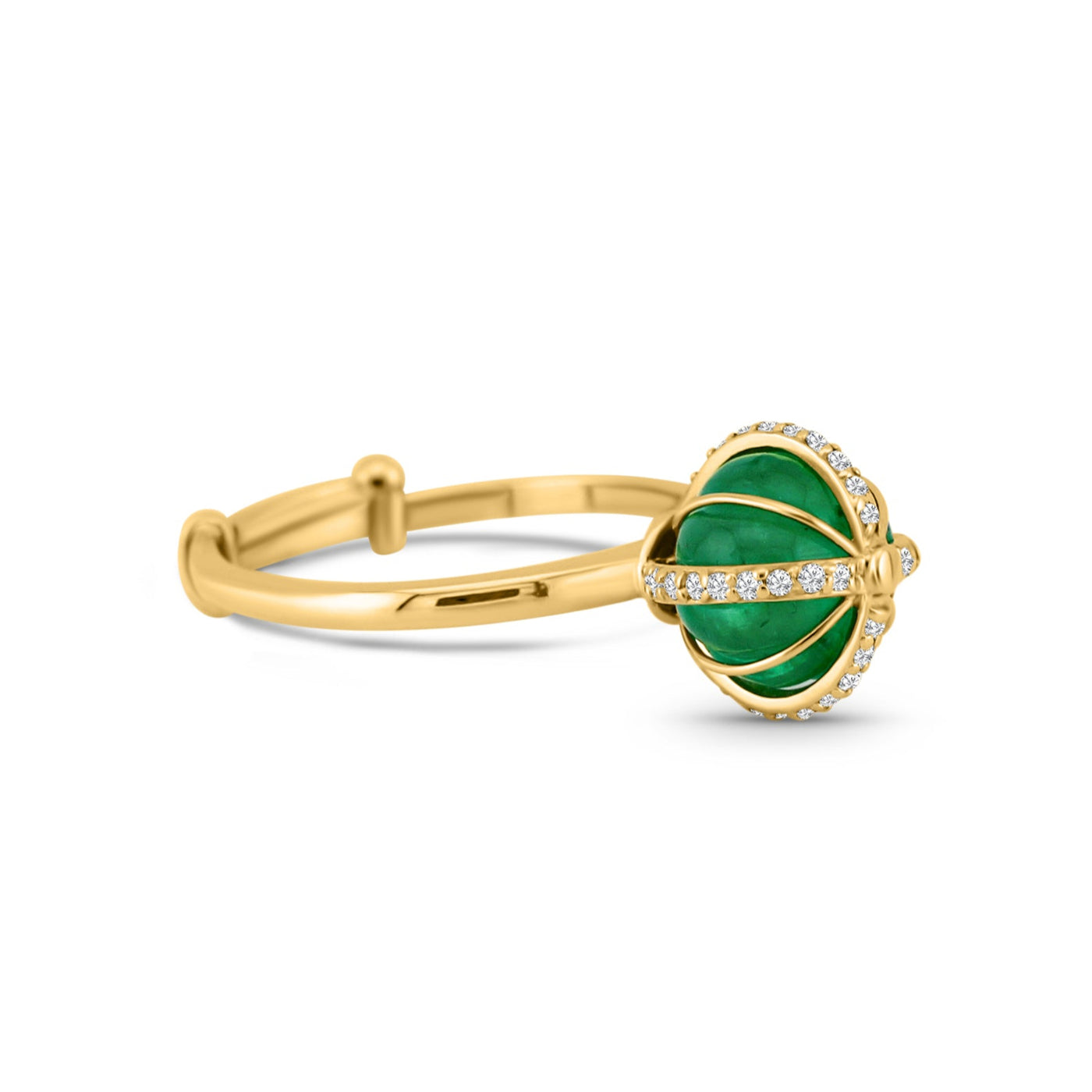 A gold ring featuring a central emerald bead surrounded by smaller beads, with a band of gold metal. 18K gold emerald ring flatlay – luxury fine jewelry by Tresor Collection