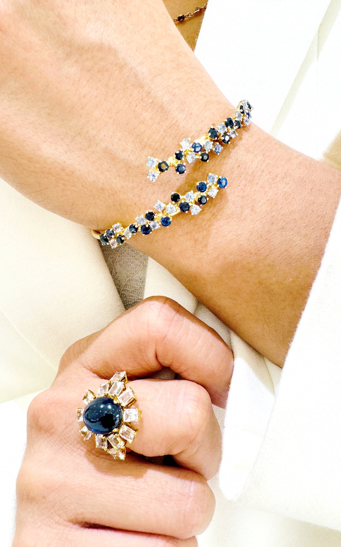 18K Gold Light & Dark Blue Sapphire Bracelet – Symphony Collection - Tresor Collection Blue Sapphire and Diamond statement ring paired with gold bracelet – sophisticated gemstone jewelry styling