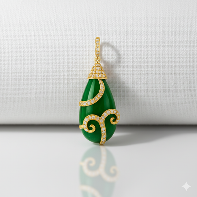 Green teardrop pendant with gold accents on a light gray background