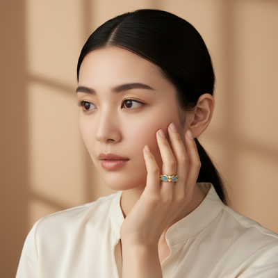 Woman wearing a ring with a beige background