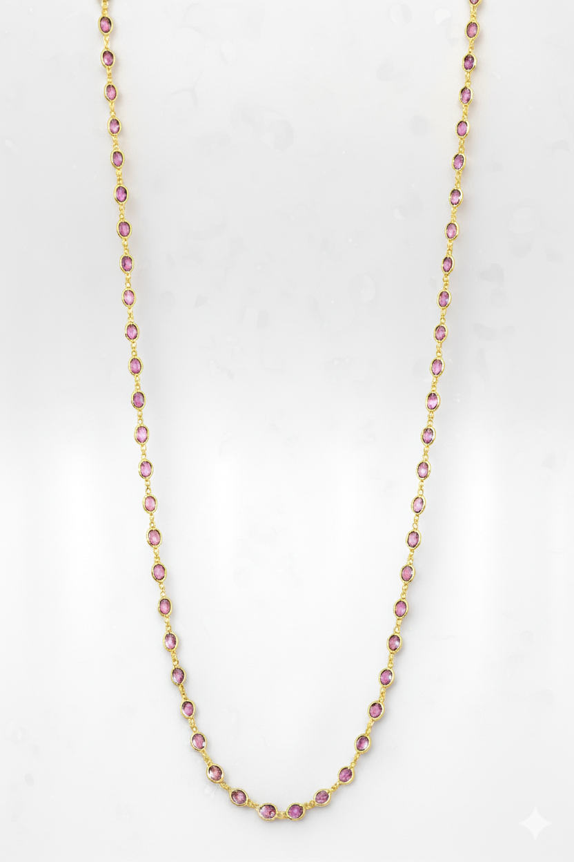 Necklace with pink gemstones on a white background