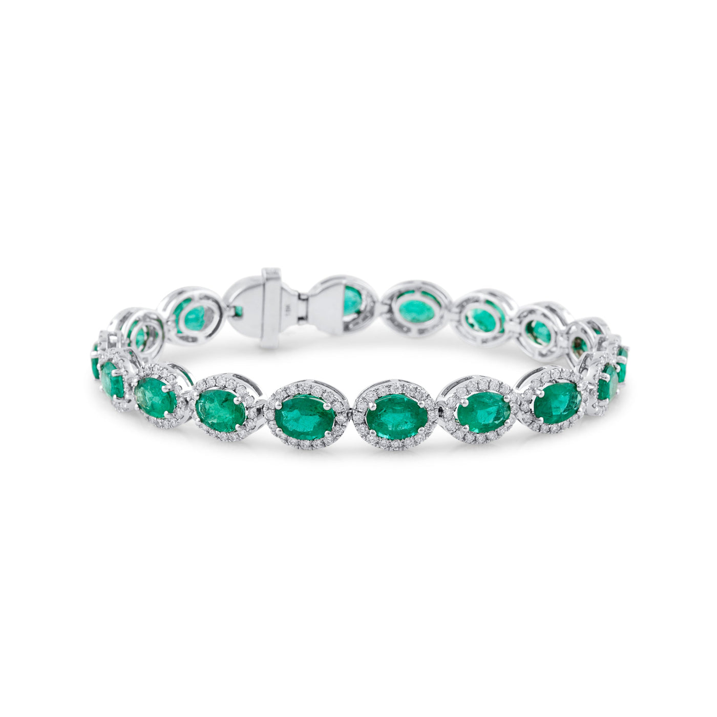 18K White Gold Emerald & Diamond Oval Bracelet by Tresor Collection White gold oval-cut emerald bracelet flatlay – elegant green gemstone jewelry by Tresor Collection