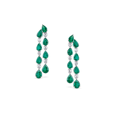 18K White Gold Pear Shape Emerald & Diamond Earrings by Tresor Collection 18K white gold emerald and diamond drop earrings flatlay – luxury handcrafted jewelry by Tresor Collection