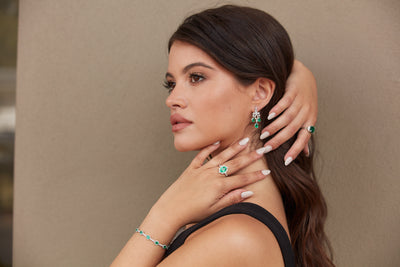 Emerald P/S & Diamond Earring In 18K White Gold - Tresor Collection Model wearing emerald and diamond chandelier earrings – elegant fine jewelry look