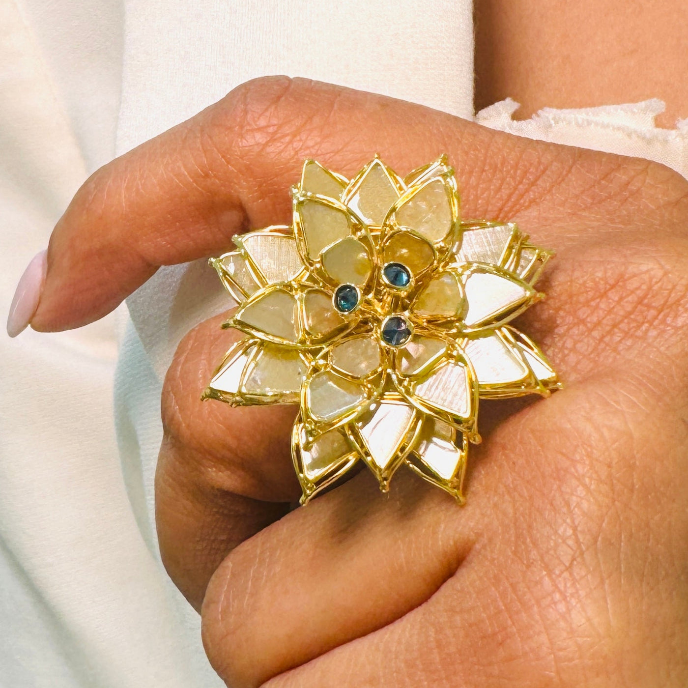 Floral cocktail ring on hand – luxury 18K yellow gold designer ring for special occasions by Tresor Collection
