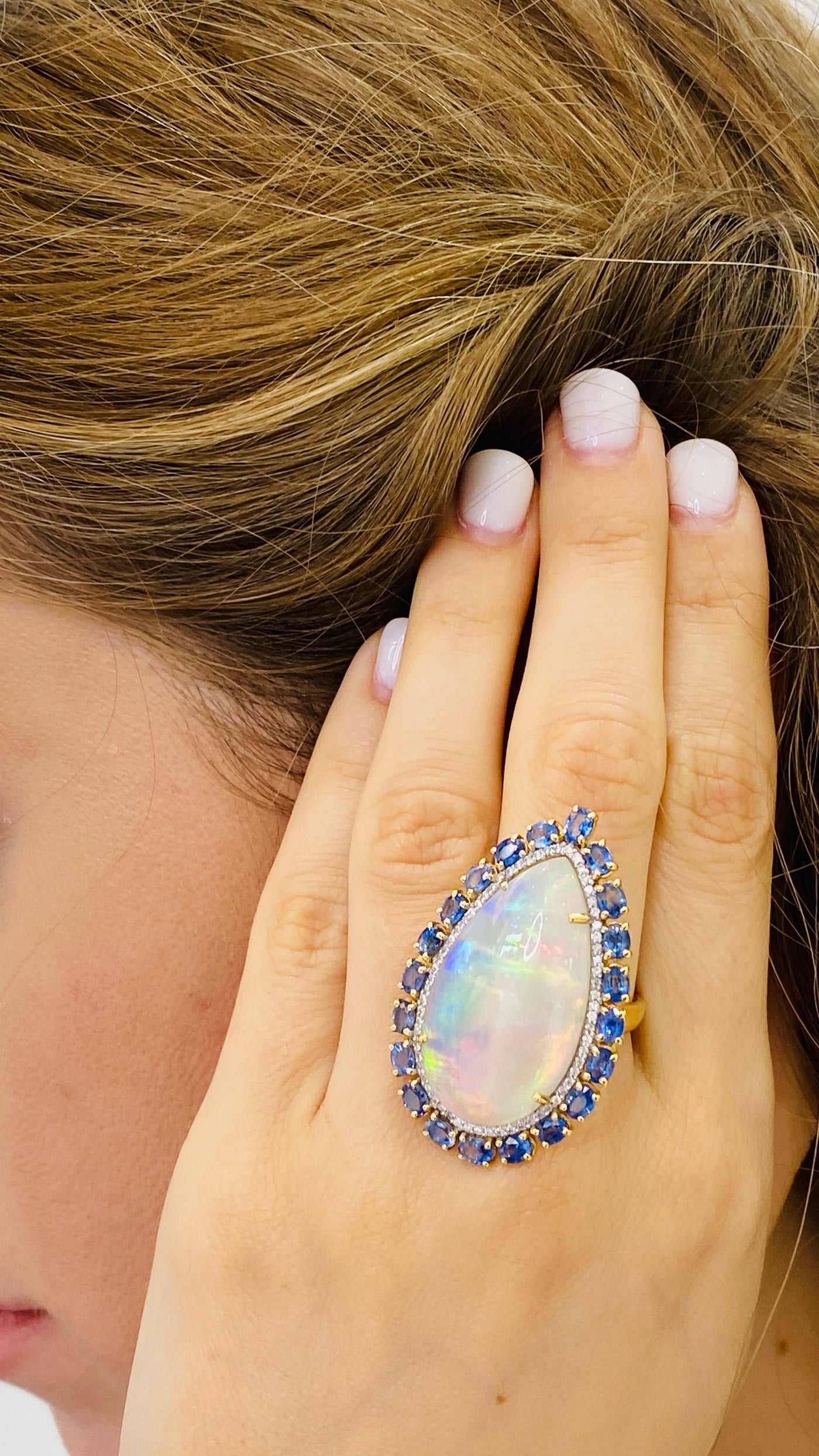 Ethiopian Opal Pear Shape, Blue Sapphire And Diamond Ring In 18K Yellow Gold