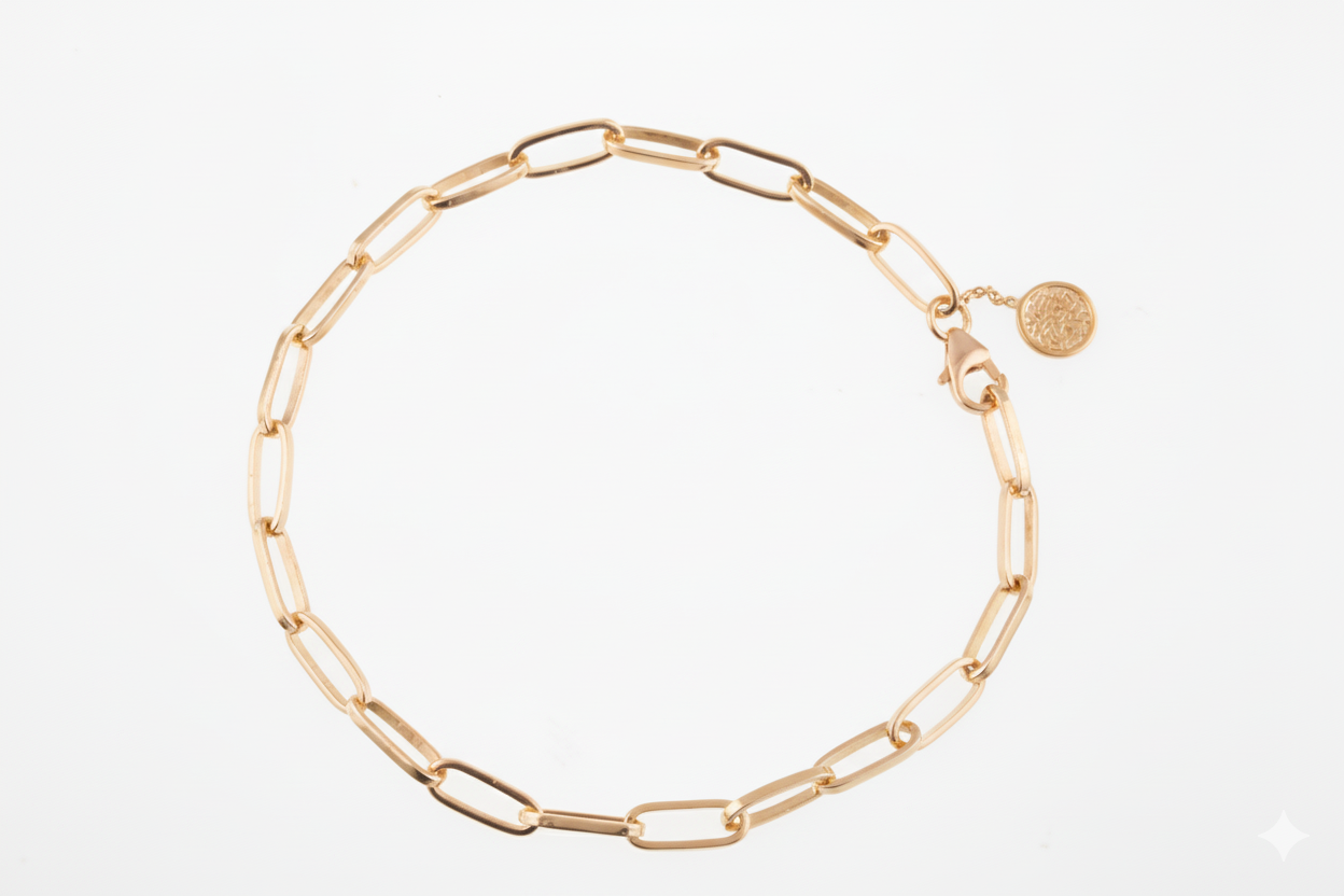 Gold chain bracelet on a white background