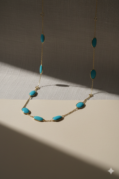 Necklace with turquoise beads on a neutral background