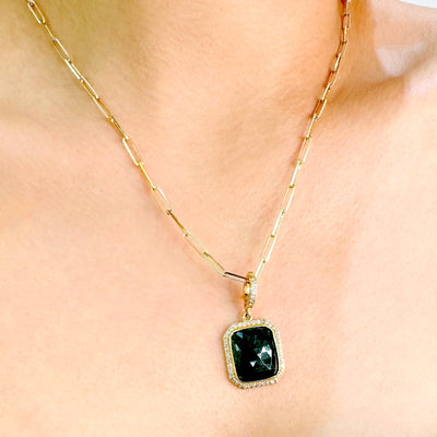 Elegant emerald and diamond pendant on model – designer gold jewelry for women by Tresor Collection