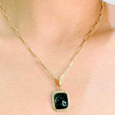 Emerald gold pendant styled for festive and bridal looks – luxury handcrafted jewelry by Tresor Collection