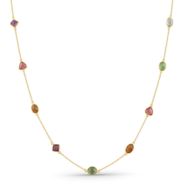 Gold necklace with multicolored gemstones on a white background 18K gold multicolor gemstone necklace flatlay – luxury fine jewelry by Tresor Collection