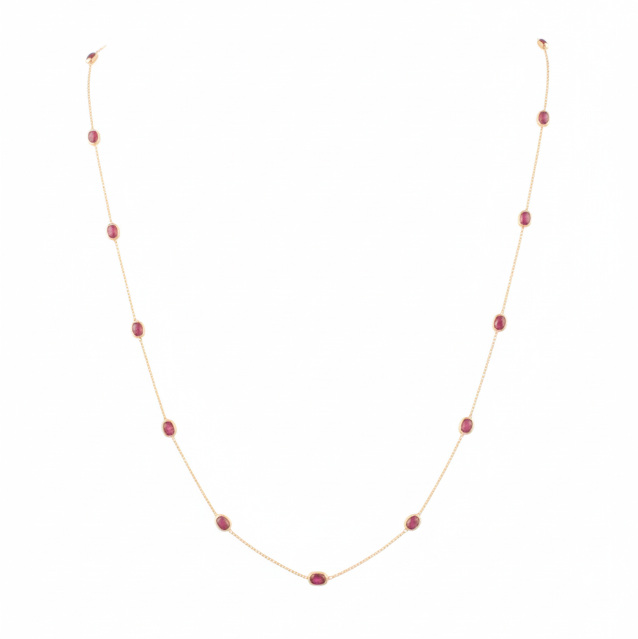 Necklace with red beads on a white background 18K gold ruby necklace flatlay – luxury fine jewelry by Tresor Collection
