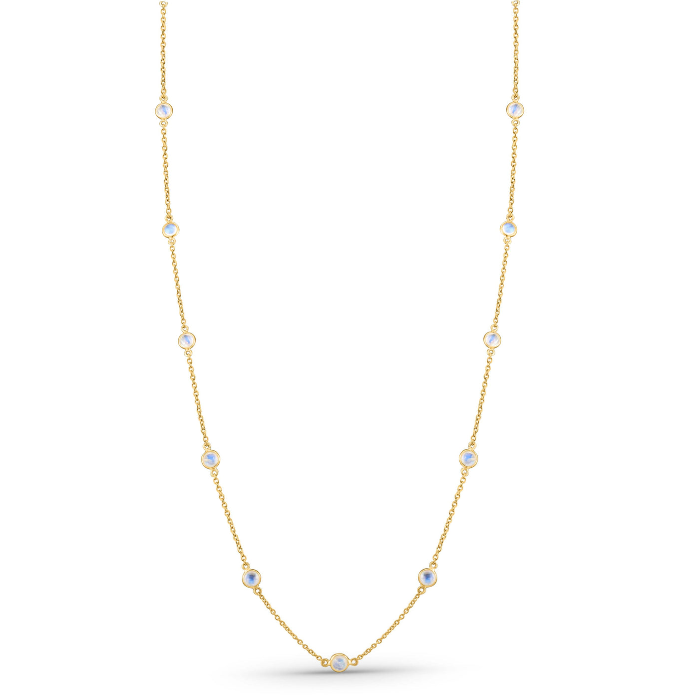 Gold necklace with small gemstones on a white background 18K gold rainbow moonstone necklace flatlay – luxury fine jewelry by Tresor Collection