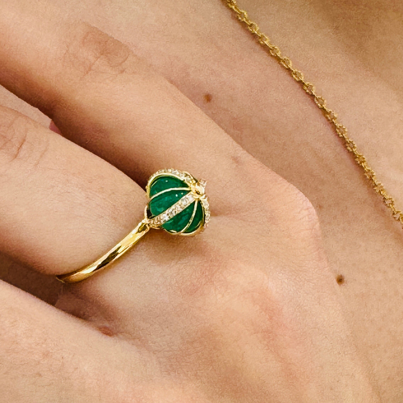 Model wearing Flora emerald and diamond beads ring styled with wedding attire Emerald gold ring styled for festive and bridal occasions – fine handcrafted jewelry from Tresor Collection