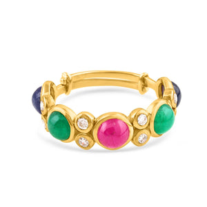 Gold bracelet with colorful gemstones on a white background 18K gold emerald, ruby, sapphire & diamond ring flatlay – luxury fine jewelry by Tresor Collection